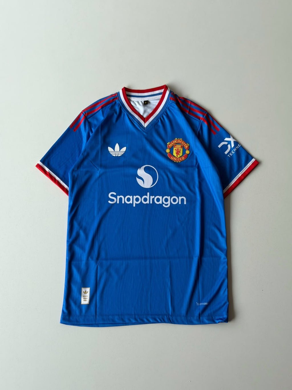 MAN UTD AWAY HEAT PRESSED LOGO - MAINOO