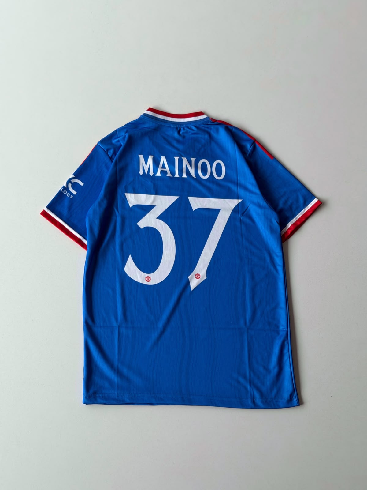 MAN UTD AWAY HEAT PRESSED LOGO - MAINOO