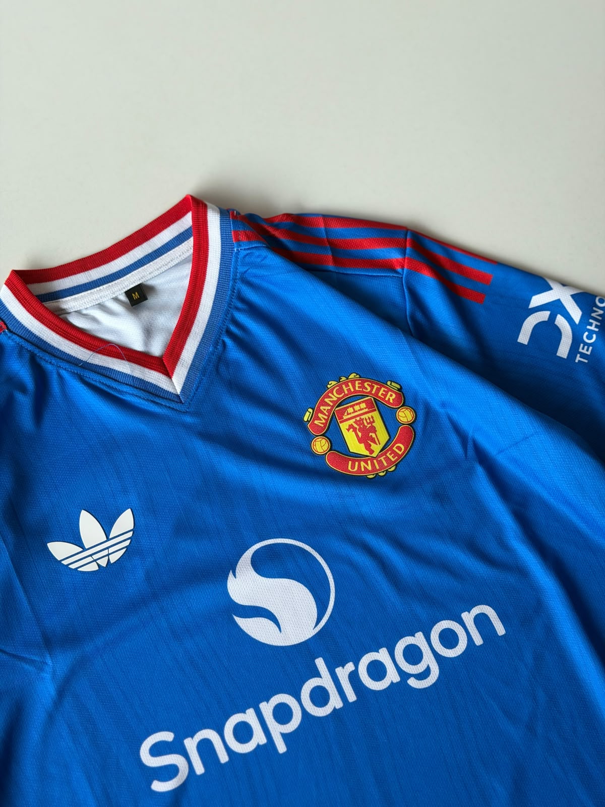 MAN UTD AWAY HEAT PRESSED LOGO - MAINOO